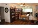 This dining area has hardwood floors, a book shelf and seating for four at 2020 World Parkway Blvd # 12, Clearwater, FL 33763