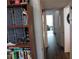 Hallway with hardwood floors, leading to other rooms of the home at 2020 World Parkway Blvd # 12, Clearwater, FL 33763