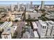 An aerial view of a city street with commercial buildings and residential apartments at 219 4Th N Ave # 201, St Petersburg, FL 33701
