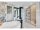 Elegant main bathroom featuring a soaking tub, modern fixtures, and tiled walk-in shower at 2641 Whittler Br, Odessa, FL 33556