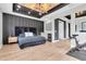 Spacious main bedroom featuring a wet bar, statement lighting, and workout area at 2641 Whittler Br, Odessa, FL 33556
