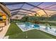 Covered pool area with putting green at 2641 Whittler Br, Odessa, FL 33556