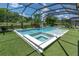Stunning pool area with a spa, water features, and lush landscaping at 2641 Whittler Br, Odessa, FL 33556
