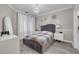 Inviting bedroom with plush bedding, modern decor, and soft natural light at 2722 Via Tivoli # 430A, Clearwater, FL 33764