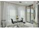 A bright breakfast nook with a table setting, perfect for morning meals at 2722 Via Tivoli # 430A, Clearwater, FL 33764
