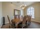 Dining room with large table, ornate chairs, and chandelier at 2722 Via Tivoli # 430A, Clearwater, FL 33764