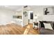 Bright living space features hardwood floors and an eat-in kitchen at 2969 Bonaventure Cir # 104, Palm Harbor, FL 34684