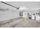 Spacious garage with a water heater, and washer and dryer at 3224 Hilary Cir, Palm Harbor, FL 34684