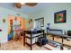Bright office showcasing tiled floors, a large desk, and office supplies at 3406 Hollyhock Way, Tampa, FL 33618