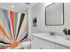 Chic bathroom with a unique shower curtain, modern mirror, and sleek vanity at 3757 Villamore Ln, Odessa, FL 33556