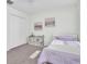 Comfortable bedroom featuring a single bed, cube storage, and ample space at 3757 Villamore Ln, Odessa, FL 33556