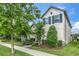 Beautiful two-story home with well-manicured landscaping and charming curb appeal at 3757 Villamore Ln, Odessa, FL 33556
