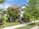 Charming two-story home with a covered porch, landscaped yard, and inviting curb appeal at 3757 Villamore Ln, Odessa, FL 33556