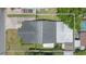 Aerial view showcasing the roof, backyard, and surrounding property lines at 39055 9Th Ave, Zephyrhills, FL 33542