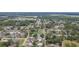 Neighborhood featuring single-Gathering homes, a body of water, and many trees at 39055 9Th Ave, Zephyrhills, FL 33542