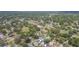 Residential area with many trees, community buildings, and single Gathering homes in close proximity to one another at 39055 9Th Ave, Zephyrhills, FL 33542