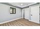 Inviting bedroom with wood floors, closet, and window at 400 83Rd Ne Ave, St Petersburg, FL 33702