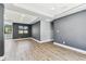 Bright living area with modern flooring and a view of the neighborhood at 400 83Rd Ne Ave, St Petersburg, FL 33702