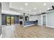 Open living area featuring wood floors and sliding glass doors to backyard at 400 83Rd Ne Ave, St Petersburg, FL 33702