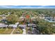 An aerial photo shows the house is near a tree and in a neighborhood with a pin on its location at 4642 29Th N Ave, St Petersburg, FL 33713