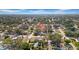An aerial perspective highlighting a home's location within a well-established neighborhood surrounded by trees and amenities at 4642 29Th N Ave, St Petersburg, FL 33713