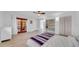Serene bedroom with hardwood floors, built-in shelving, and wooden doors, offering a peaceful and stylish retreat at 4642 29Th N Ave, St Petersburg, FL 33713