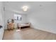 Bright bedroom featuring laminate flooring, a window for natural light, and a built in vanity at 4642 29Th N Ave, St Petersburg, FL 33713