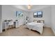 Inviting bedroom with two windows, laminate flooring, and ample space for comfort and relaxation at 4642 29Th N Ave, St Petersburg, FL 33713