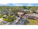 A delightful home shaded by mature trees, a driveway, and a neatly kept lawn in a serene neighborhood at 4642 29Th N Ave, St Petersburg, FL 33713