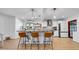 Stylish kitchen featuring a marble island, trendy pendants, and modern appliances for an inviting atmosphere at 4642 29Th N Ave, St Petersburg, FL 33713