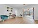 Open living room showcasing hardwood floors and a seamless indoor/outdoor transition to the patio at 4642 29Th N Ave, St Petersburg, FL 33713