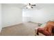 Comfortable living room features carpet, neutral colors and sectional sofa creating a relaxing atmosphere at 4732 Ashburn Pond Way, Tampa, FL 33610