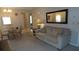 Bright living room featuring a dining table and a comfortable sofa at 4736 Sunny Loop, Holiday, FL 34690