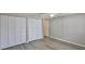 A bedroom featuring white-colored closets and light gray walls at 4801 W Mcelroy Ave # D104, Tampa, FL 33611