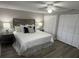 This comfortable bedroom features a spacious closet for ample storage space at 4801 W Mcelroy Ave # D104, Tampa, FL 33611