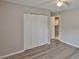 Cozy bedroom featuring ample closet space and easy access to the kitchen, combining comfort and practicality at 4801 W Mcelroy Ave # D104, Tampa, FL 33611