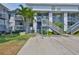 Attractive condo building with well-maintained landscaping and convenient parking at 4801 W Mcelroy Ave # D104, Tampa, FL 33611