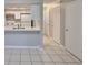 Kitchen with a pass-through to the living area and modern appliances at 4801 W Mcelroy Ave # D104, Tampa, FL 33611