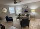 Comfortable living room with neutral walls, fan, and stylish decor for a relaxing ambiance at 4801 W Mcelroy Ave # D104, Tampa, FL 33611