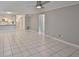 Open floor plan featuring tile flooring and a ceiling fan at 4801 W Mcelroy Ave # D104, Tampa, FL 33611
