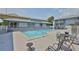 An in-ground pool is visible with table seating area at 4801 W Mcelroy Ave # D104, Tampa, FL 33611