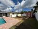 Large backyard with a tool shed and privacy fence at 5201 Denver Ne St, St Petersburg, FL 33703