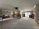 Large living room needs renovation with view of the pool at 5201 Denver Ne St, St Petersburg, FL 33703