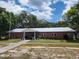 Exterior view of community building at 5318 Mary St, Zephyrhills, FL 33542