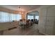 Bright dining room featuring classic chandelier and an open floor plan at 5318 Mary St, Zephyrhills, FL 33542
