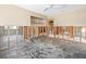 Bedroom mid renovation with window views and ceiling fan at 5409 Pali Way, St Pete Beach, FL 33706