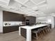 Contemporary kitchen with a large island, modern appliances, and stylish cabinetry at 5409 Pali Way, St Pete Beach, FL 33706