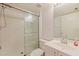 Bright bathroom with glass enclosed shower and white sink vanity at 6105 Bahia Del Mar Cir # 683, St Petersburg, FL 33715