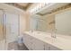 Spacious bathroom offers a dual sink vanity, large mirror and separate shower and tub at 6105 Bahia Del Mar Cir # 683, St Petersburg, FL 33715