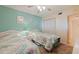 Cozy bedroom with two twin beds, closet and ceiling fan at 6105 Bahia Del Mar Cir # 683, St Petersburg, FL 33715